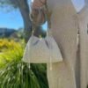 foto comprimida 11 menos 100kb Bolso de crochet beige con cierre fruncido y asa de eslabones verde oliva